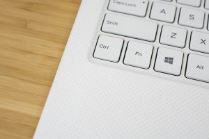 A close up of the woven fiber glass pattern on the Dell XPS 13 laptop's palm rests.