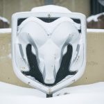 RAM logo covered in snow.