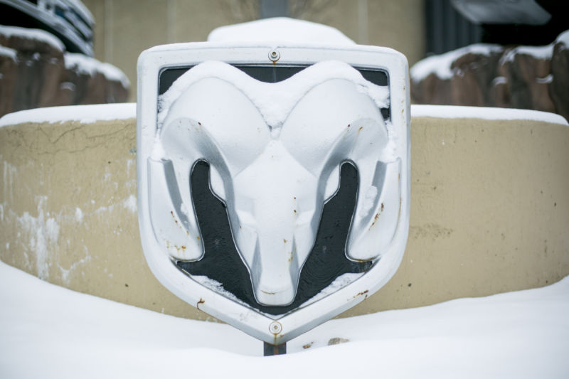 Logo RAM covered with snow.