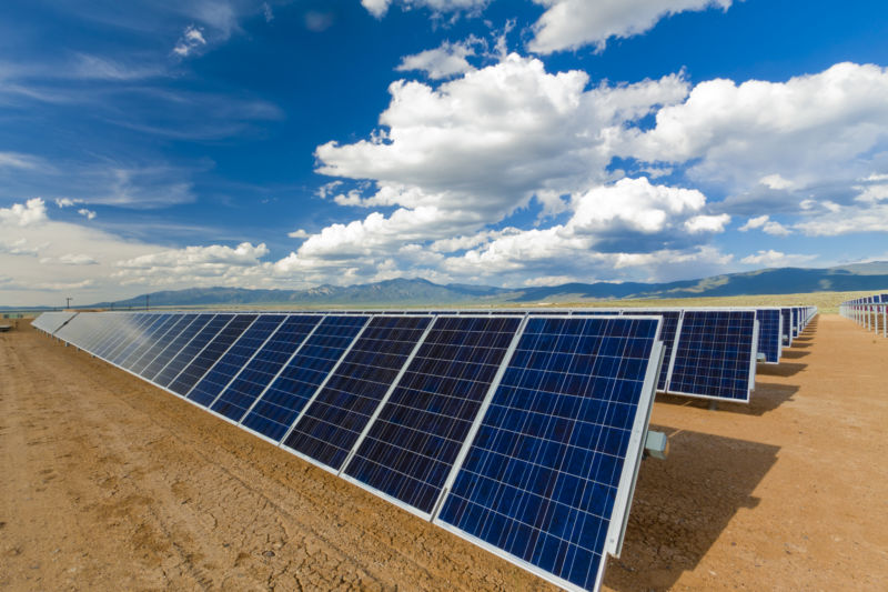 Blue sky on solar panels.