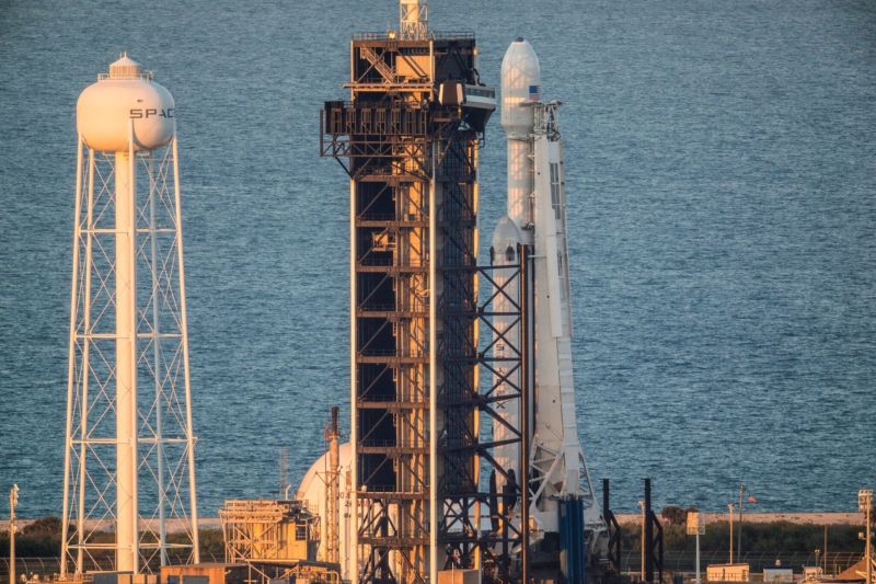 The Falcon Heavy rocket, at sunset along the Florida coast.