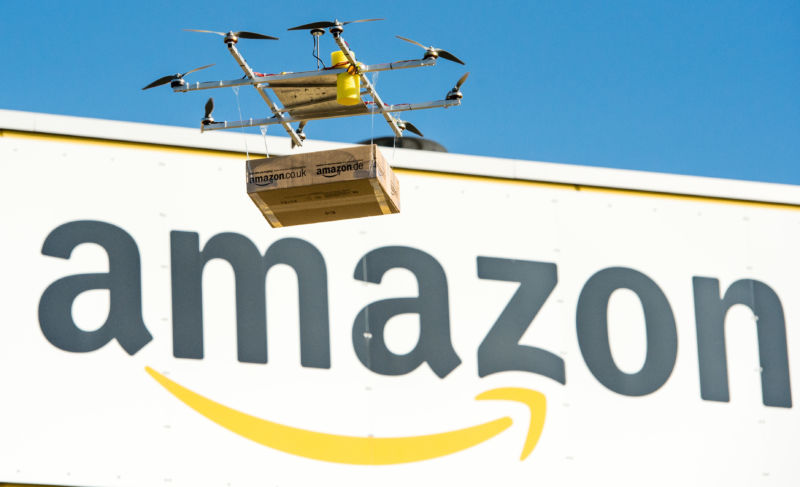 A drone with an Amazon parcel floats in front of the Amazon Logistics Center in Leipzig, Germany, on October 28, 2014. Amazon has not said whether the drones will feed this default speed acceleration per day for the payment of deliveries. 39; Amazon Prime subscribers.