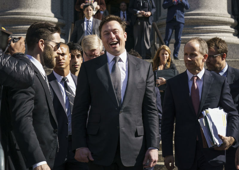 Elon Musk exits federal court on April 4, 2019 in New York City. He might be laughing at a Jeff Bezos meme.