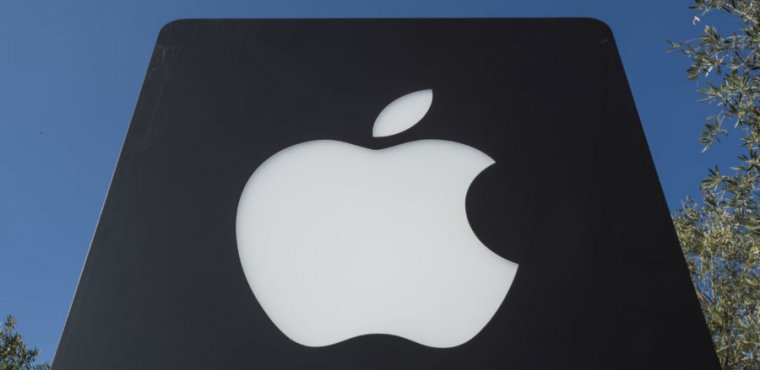A large, looming Apple logo.