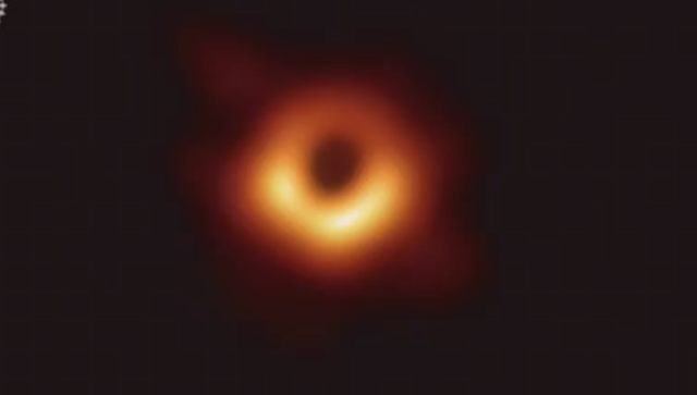 The first image of the environment around a black hole, taken by the Event Horizon Telescope collaboration in 2019. As a matter of fact, it's not all dark.