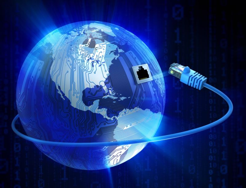 An illustration of Earth, with circuit covering North America and an Ethernet cable being plugged into the planet.