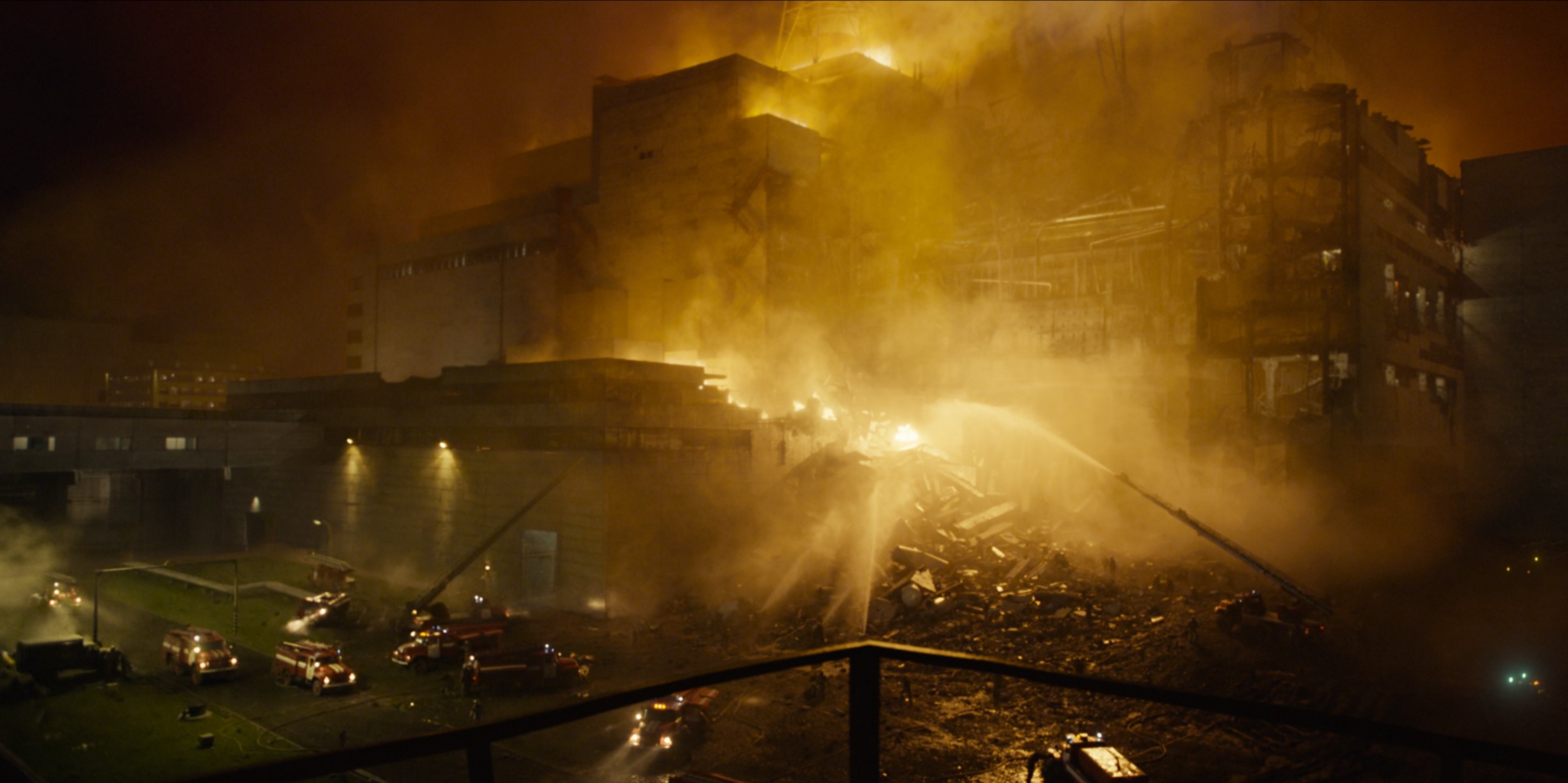 Reactor on fire as firefighters try to put it out.