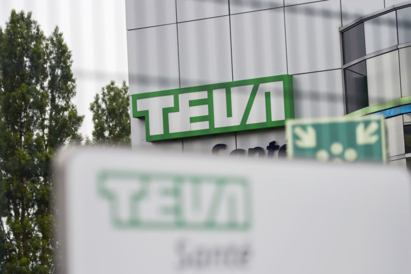 Exterior of a modern urban building with the word TEVA on it.