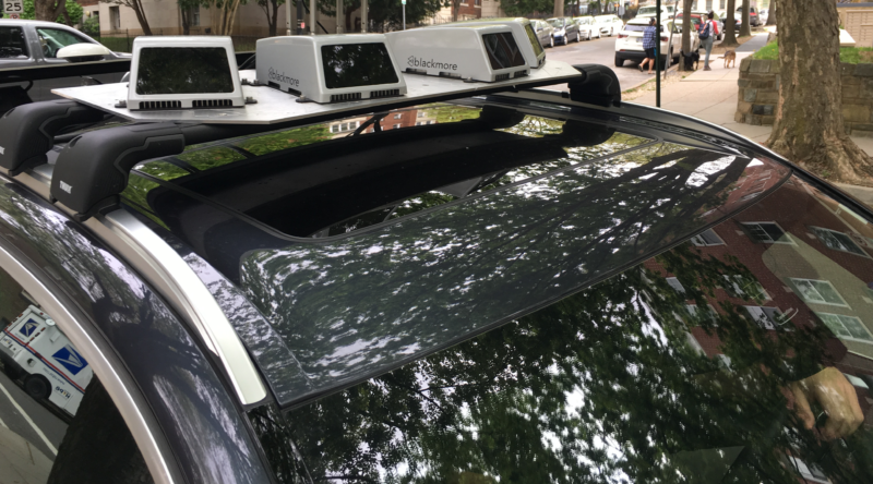 Four Blackmore lidar units sit atop a demo vehicle in Washington DC.