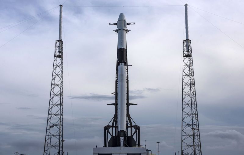 A new Falcon 9 rocket and a Dragon spaceship on the platform Thursday.