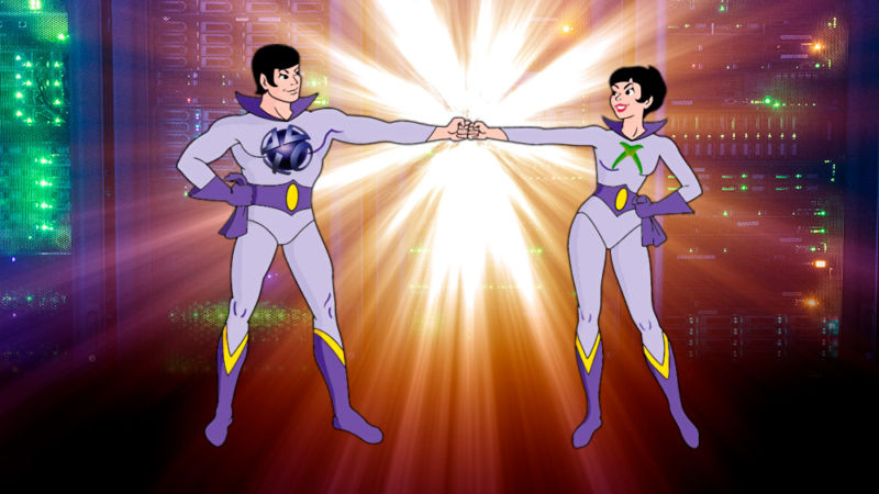 Superheroes The Wonder Twins are cracking in front of giant computer parts.