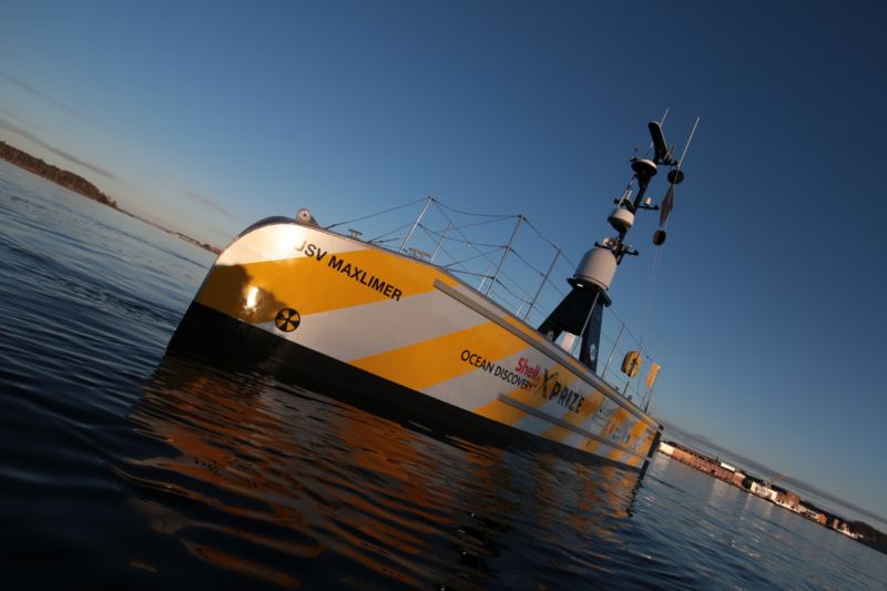 Large uncrewed ship in the water.