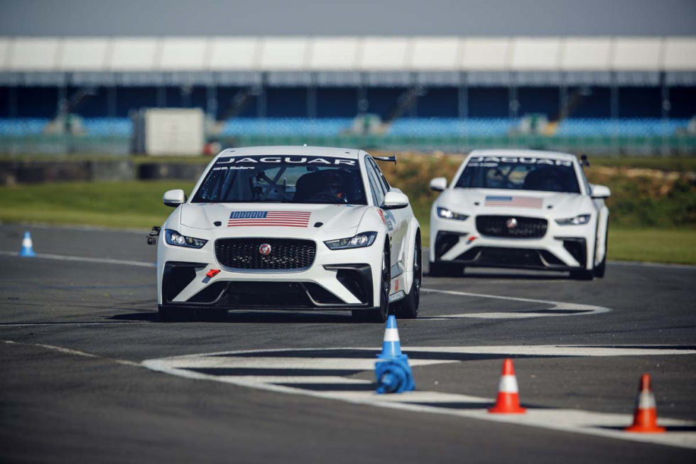 Bryan Sellers and Katherine Legge trying out their I-Pace race cars for the first time at Silverstone in the UK.