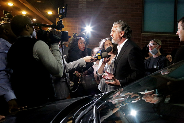 BROOKLYN, NY - JUNE 04: Anti-vaccine activist Del Bigtree speaks with journalists before entering an anti-vaccine symposium on June 4, 2019. 