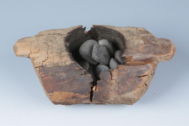 Photo of wooden brazier.