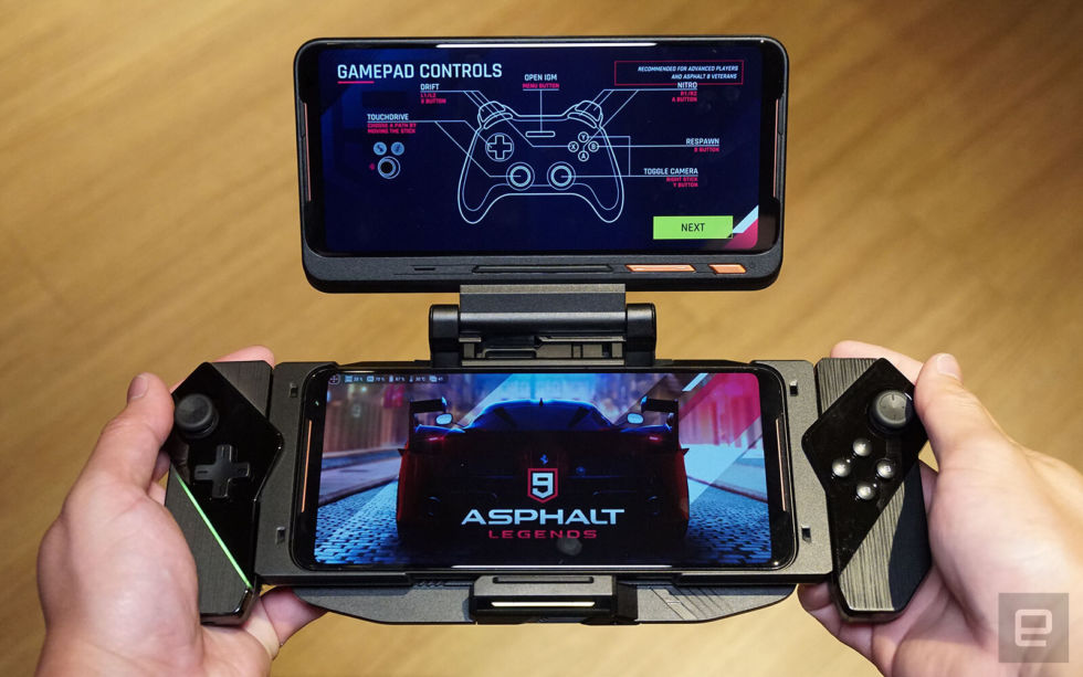 The phone, TwinView dock, and controller attached. For whatever reason, Asus doesn't have pictures of the accessories, so this is from <a href="https://www.engadget.com/2019/07/22/asus-rog-phone-ii-gaming-hands-on/">Engadget's hands-on.</a>