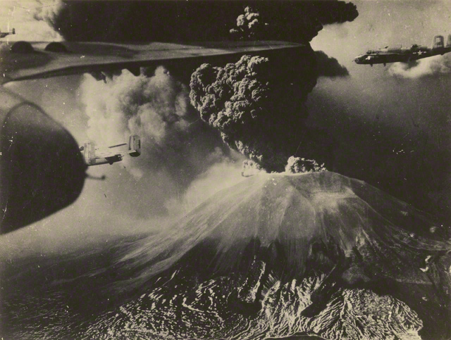 Mt. Vesuvius erupted in March 1944. Here, American B-25 Mitchell Bombers fly past Vesuvius, March 17–21, 1944.