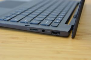 The Dell Inspiron 13 7000 Black Edition sitting on a wooden table.