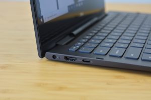 The Dell Inspiron 13 7000 Black Edition sitting on a wooden table.