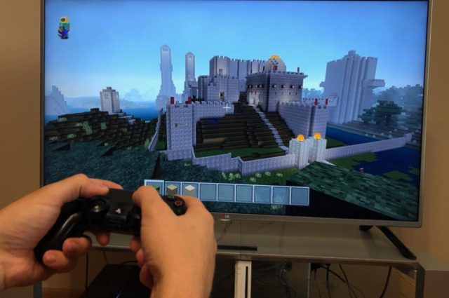 Study participants were split into groups, with some playing <em/>Minecraft and others playing a race car video game or watching TV.”/></a><figcaption><a href=