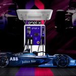 Promotional image of electric race car charging.