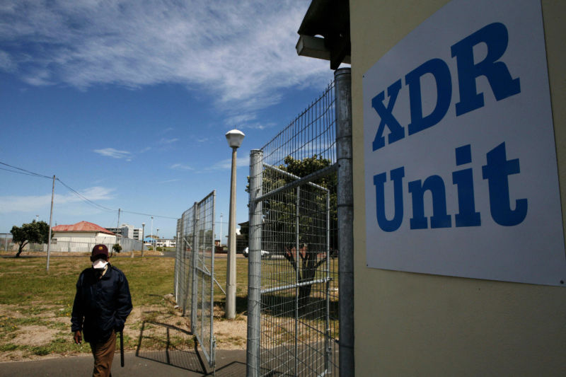 A security guard mans the gate 23 January 2008 of the ward of extreme drug resistant tuberculosis (XDR-TB), a near untreatable strain of the disease, at the Brooklyn Infectious Disease Hospital in Cape Town. The hospital is trying to take extra security measures to ensure patients with XDR stay there for treatment, instead of leaving to go back to their communities, still highly contagious.