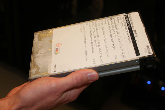 Projectionist Noah Fife holds a hard drive containing <em>Apocalypse Now Final Cut</em>.
