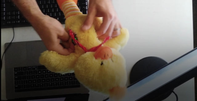 A plush toy makes a good platform for hacking hardware in this still from an IBM video.