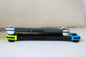 Promotional images of handheld gaming console.