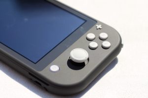 Promotional images of handheld gaming console.
