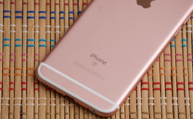 Closeup image of rose-colored smartphone.