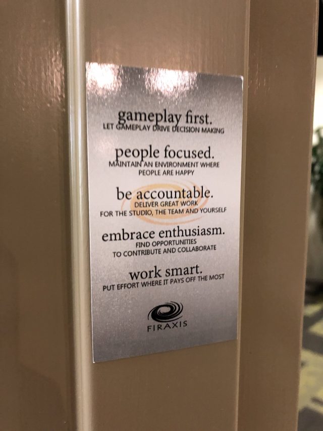 A sign showing Firaxis family values