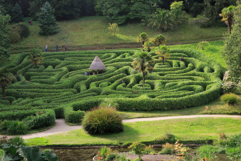 People exploring the Maze at Glendurgan Garden, Cornwall, England, UK. (Photo by: Geography Photos/Universal Images Group via Getty Images)