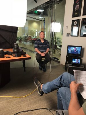 Image of Justin conducting interview with Sid