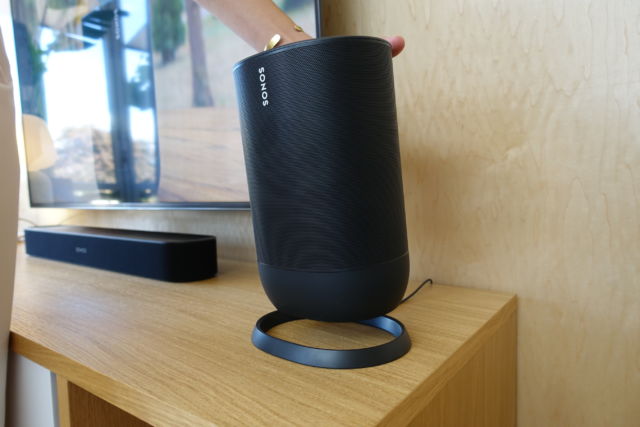 The Sonos Move pops on and off its charging base easily.