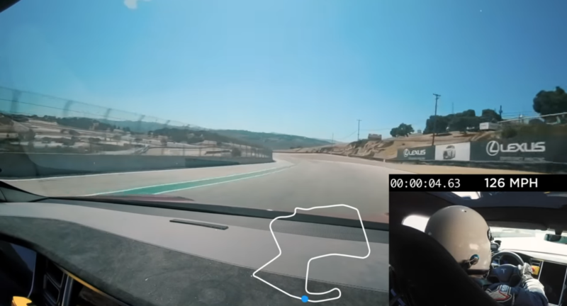 Driver's perspective of a Tesla on a racetrack.