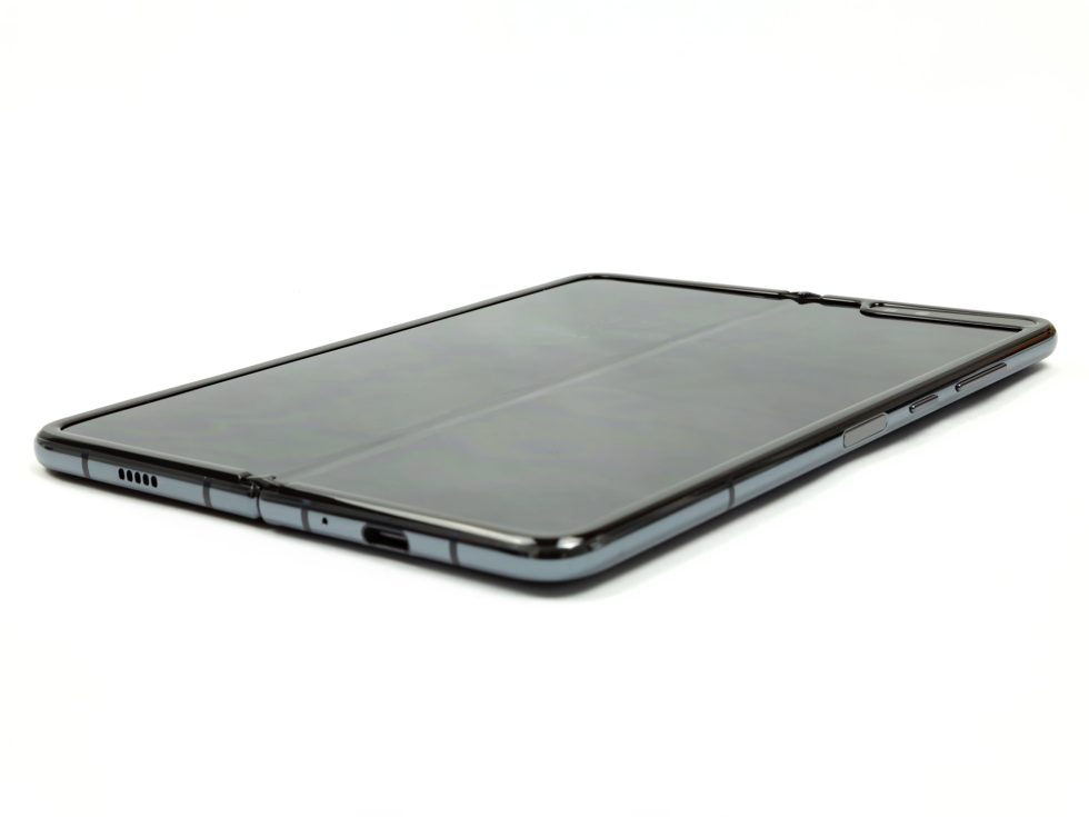 That crease is not well supported and forms a valley on the face of the phone. You'll feel it every time.