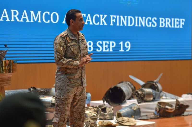 Saudi defence ministry spokesman Colonel Turki bin Saleh al-Malki displays pieces of what he said were Iranian cruise missiles and drones recovered from the attack site that targeted Saudi Aramco's facilities, during a press conference in Riyadh on September 18, 2019.  US officials have now said that the US responded with a cyber attack against Iran's "propaganda" infrastructure.