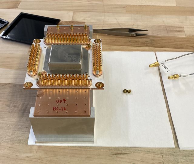 The chip's packaging is dominated by the wiring needed to feed signals in and out of the chip.