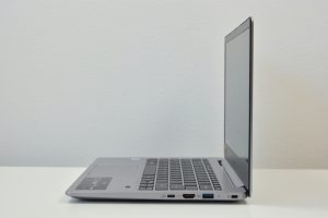The Acer Swift 3 laptop on a white table.