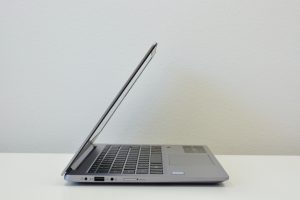 The Acer Swift 3 laptop on a white table.