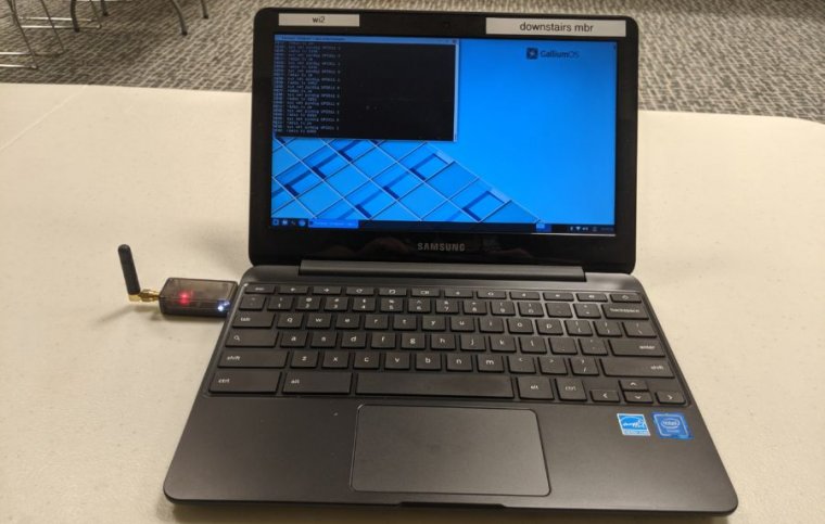 Lostik is plugged in to the left USB port of this Samsung Chromebook running GalliumOS Linux. It's currently transmitting packets, using the sample sender.py utility, from a basement about 15 feet underground.