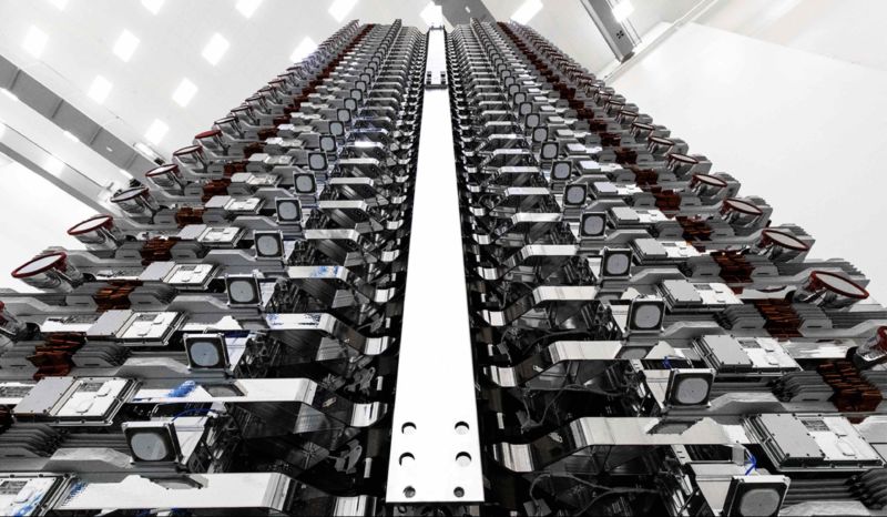 60 of SpaceX's broadband satellites stacked before launch.