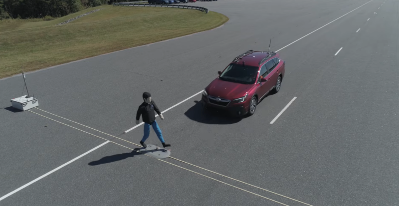 A Subaru Outback successfully stops for a "pedestrian" crossing the road in front of it.