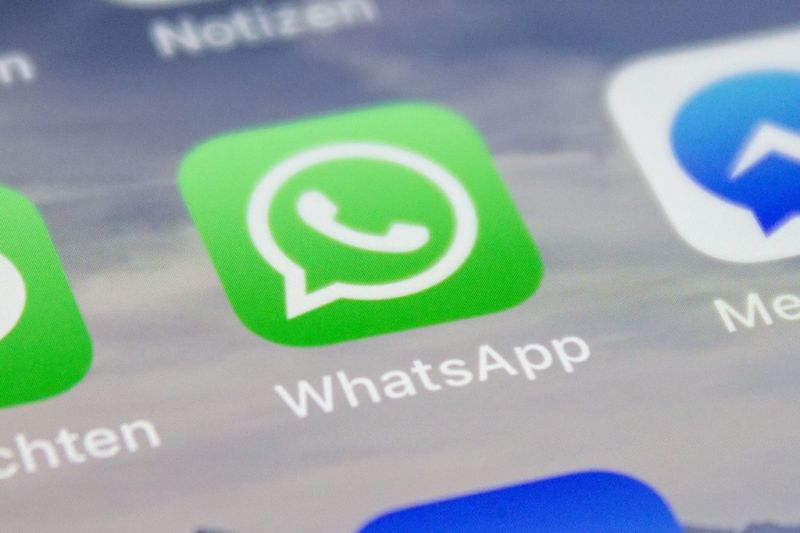 Extreme closeup image of WhatsApp on smartphone.