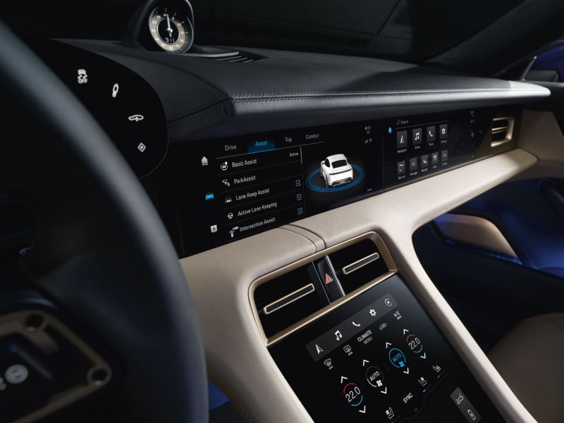 The Porsche Taycan can feature up to four touchscreens, three of which are seen here. That might be overkill.