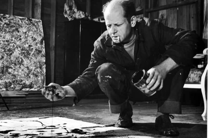 Jackson Pollock working in his Long Island studio adjacent to his home in 1949.