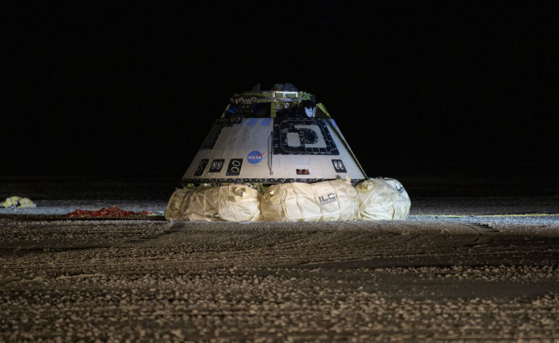 The Boeing CST -100 Starliner spacecraft is seen after landing in White Sands, New Mexico on Sunday, Dec. 22, 2019.