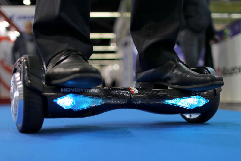 A man tests out a Hovertrax hoverboard produced by Razor at the International Toy Fair 2017 in Nuremberg, Germany, on January 1, 2017. 