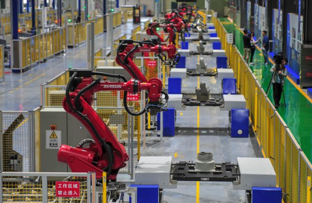 An automated robot production line at SIASUN Robot & Automation Co., Ltd. High-density IoT deployments could put monitoring tags on everything in this picture.